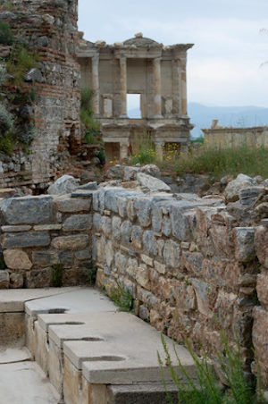 Ephesus Latrines with the Library of Celsus in the background