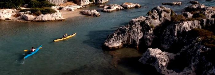 Canoeing around the bay of Aperlai Sunken Harbour