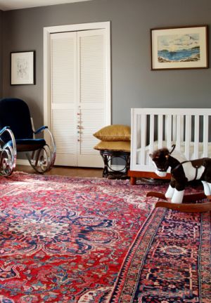 A modern kid room decorated with an oriental Turkish carpet