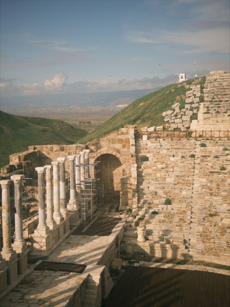 The Seven Churches Today: Modern Names, Locations, and How to Visit Them 12 Restored colonnade and seating of a theater in Laodicea with the Lycus Valley behind it