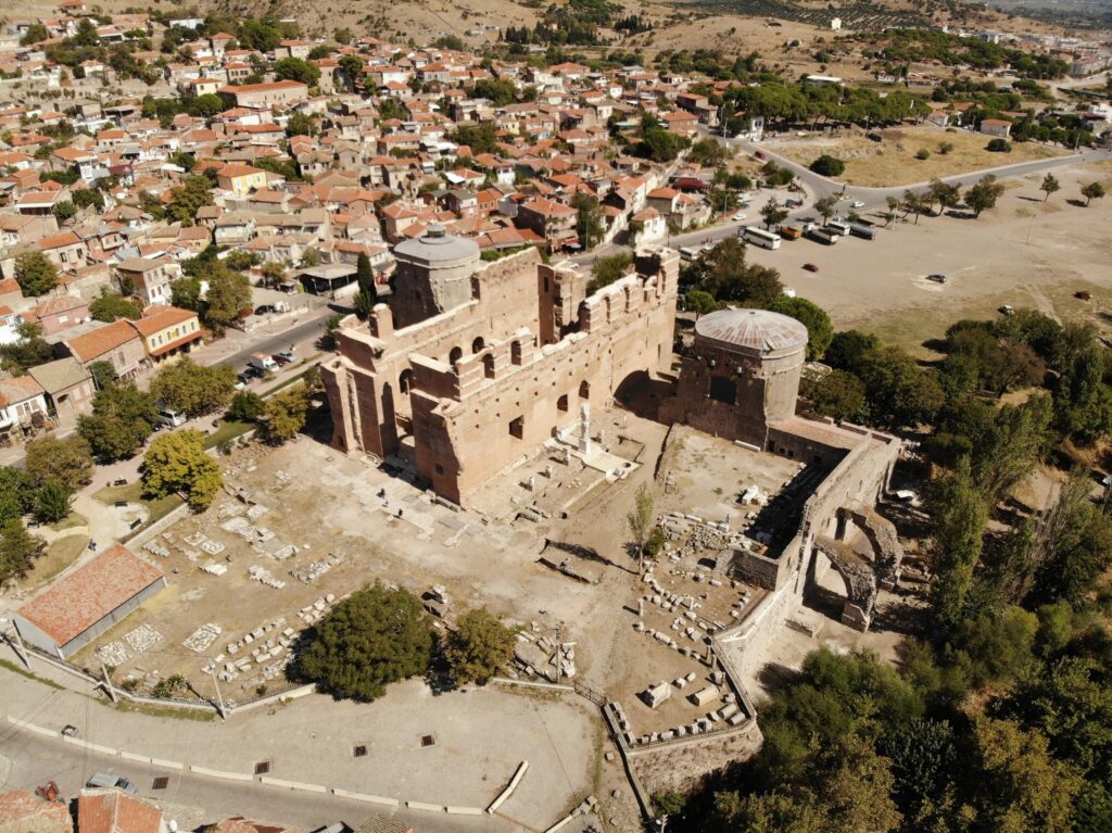 The Seven Churches Today: Modern Names, Locations, and How to Visit Them 7 The Red Basilica, Kızıl Avlu, with its round tower among the houses of modern Bergama