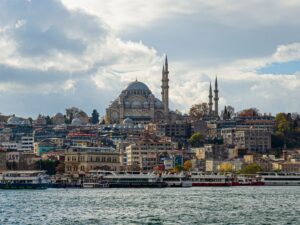 Süleymaniye Mosque on the hill above the Golden Horn in Istanbul, where Leonardo da Vinci proposed a bridge, with ferries moored in front