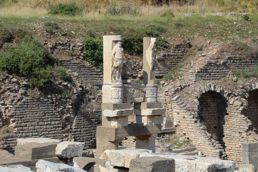 Temple of Domitian in Ephesus and Why the City Was Called Neokoros 4 Pillars with carved figures in front of the vaulted terrace of the Temple of Domitian