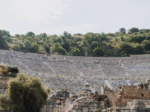 Curved rows of seats of the Great Theater of Ephesus on the hillside, a theater whose first phase belongs to the Hellenistic period